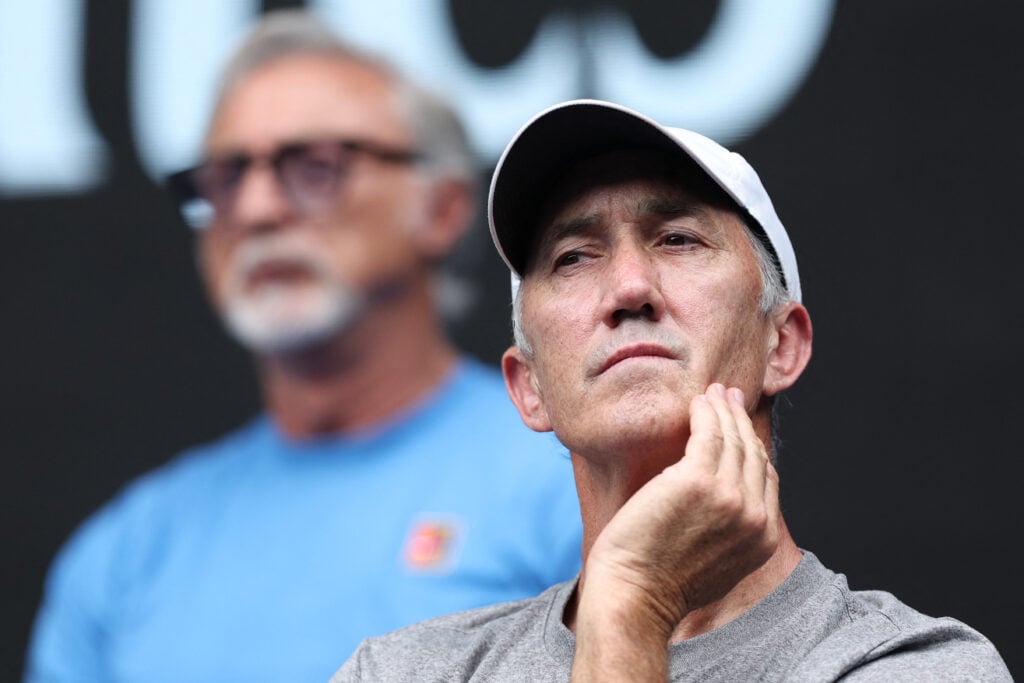 Darren Cahill watching Jannik Sinner play Holger Rune at the 2025 Australian Open