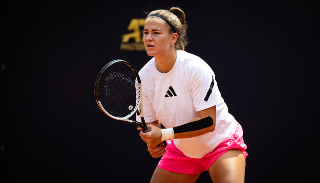 Karolina Muchova prepares to return serve during practice at the Internazionali BNL D'Italia 2025 - Day Three