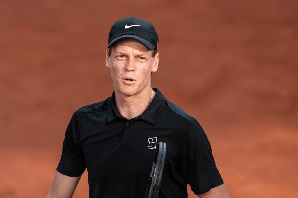 Jannik Sinner looking up to his box during his defeat to Carlos Alcaraz at the Italian Open