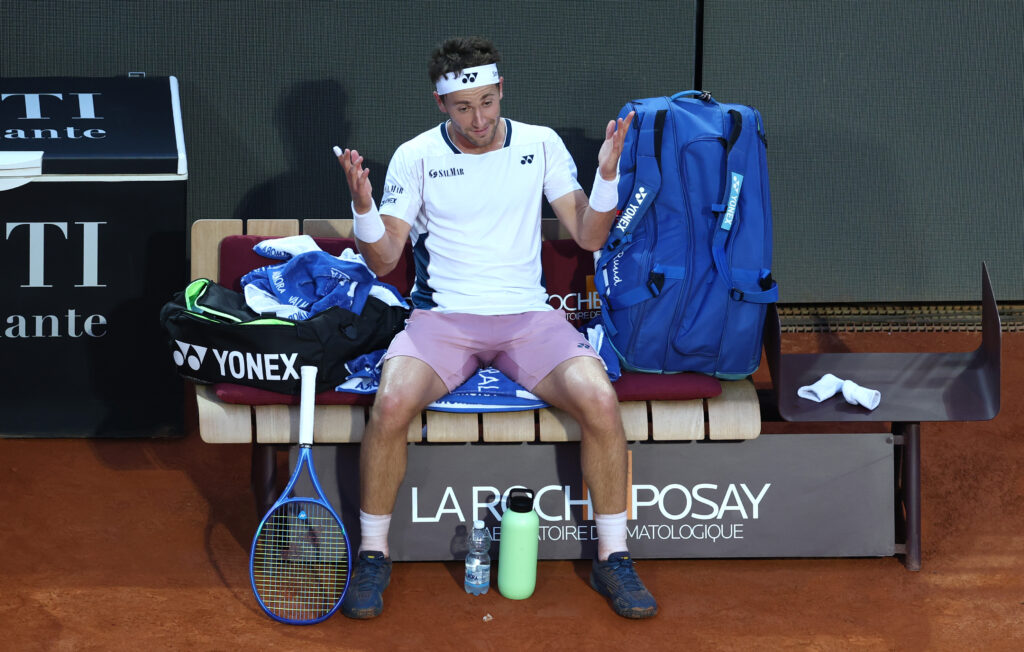 Casper Ruud reacts during a break while losing to Jannik Sinner at the Italian Open