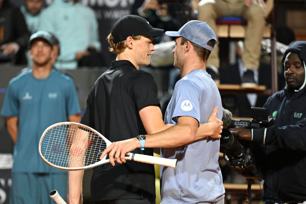 Jannik Sinner hugs Tommy Paul after beating him at the 2025 Italian Open.