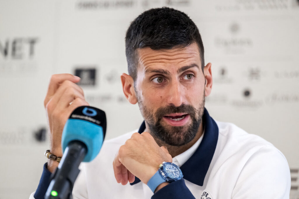Novak Djokovic speaks during a press conference at the 2025 Geneva Open