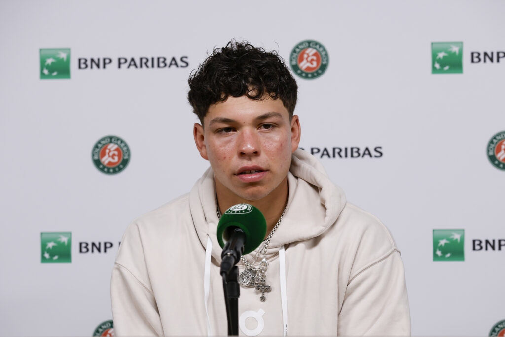 Ben Shelton answers questions during a press conference ahead of the 2025 French Open