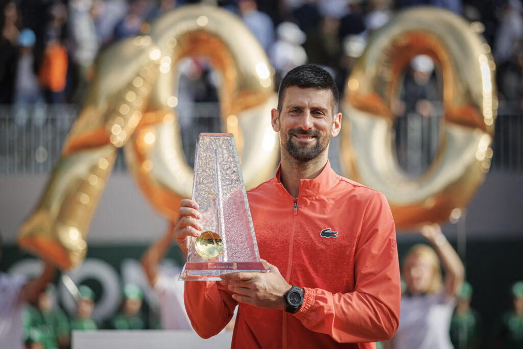 Novak Djokovic celebrates with the 2025 Geneva Open title