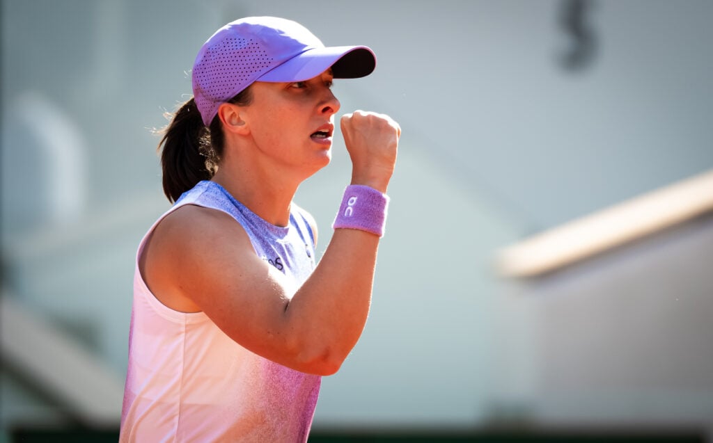 Iga Swiatek celebrates during her win over Emma Raducanu at the 2025 French Open