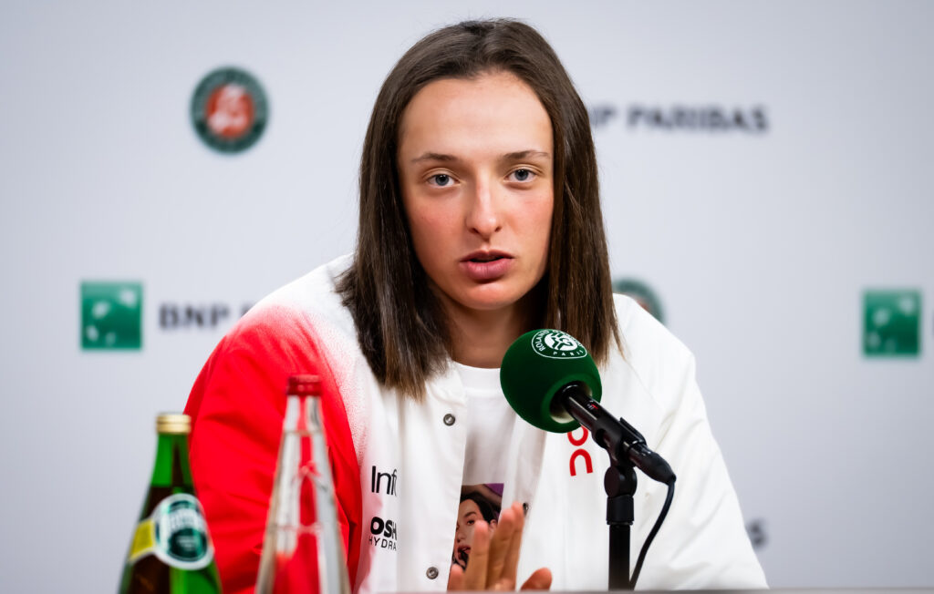 Iga Swiatek answers questions during her post-match press conference at the 2025 French Open