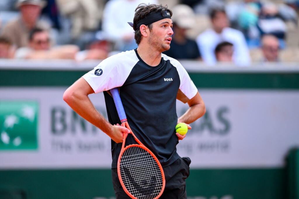 Taylor Fritz of United States reacts during the Men's Singles First Round match on Day Two of the 2025 French Open at Roland Garros.