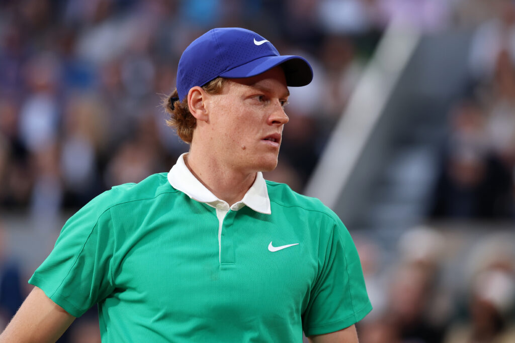 Jannik Sinner of Italy looks on against Arthur Rinderknech of France during the Men's Singles First Round match on Day Two of the 2025 French Open at Roland Garros.