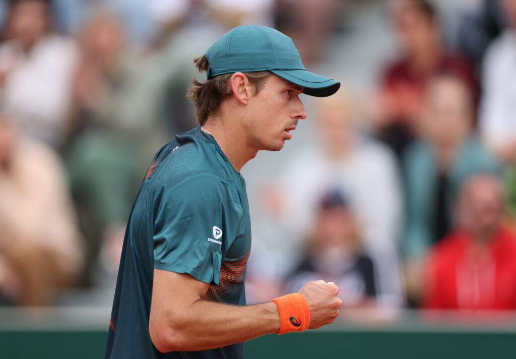 Alex de Minaur celebrates winning a point against Laslo Djere at the 2025 French Open