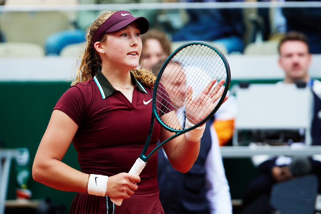 Mirra Andreeva celebrates her victory over Cristina Bucsa of Spain during the Women's Singles First Round match during Day Three of the 2025 French Open at Roland Garros.