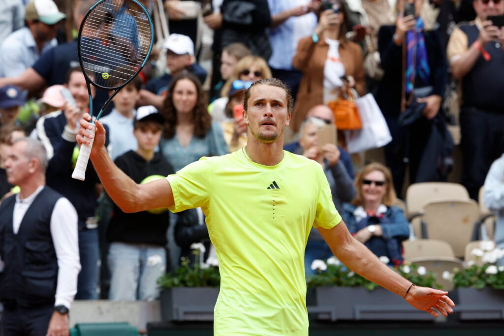 Alexander Zverev celebrates after beating Learner Tien at the 2025 French Open