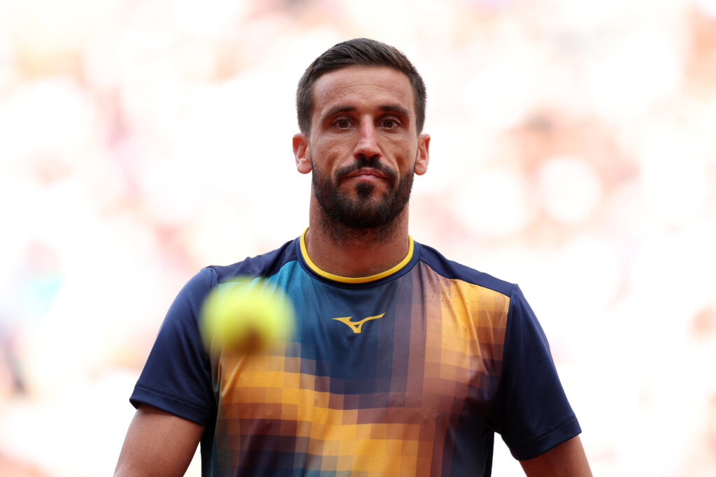 Damir Dzumhur looks on during his second-round match at the 2025 French Open