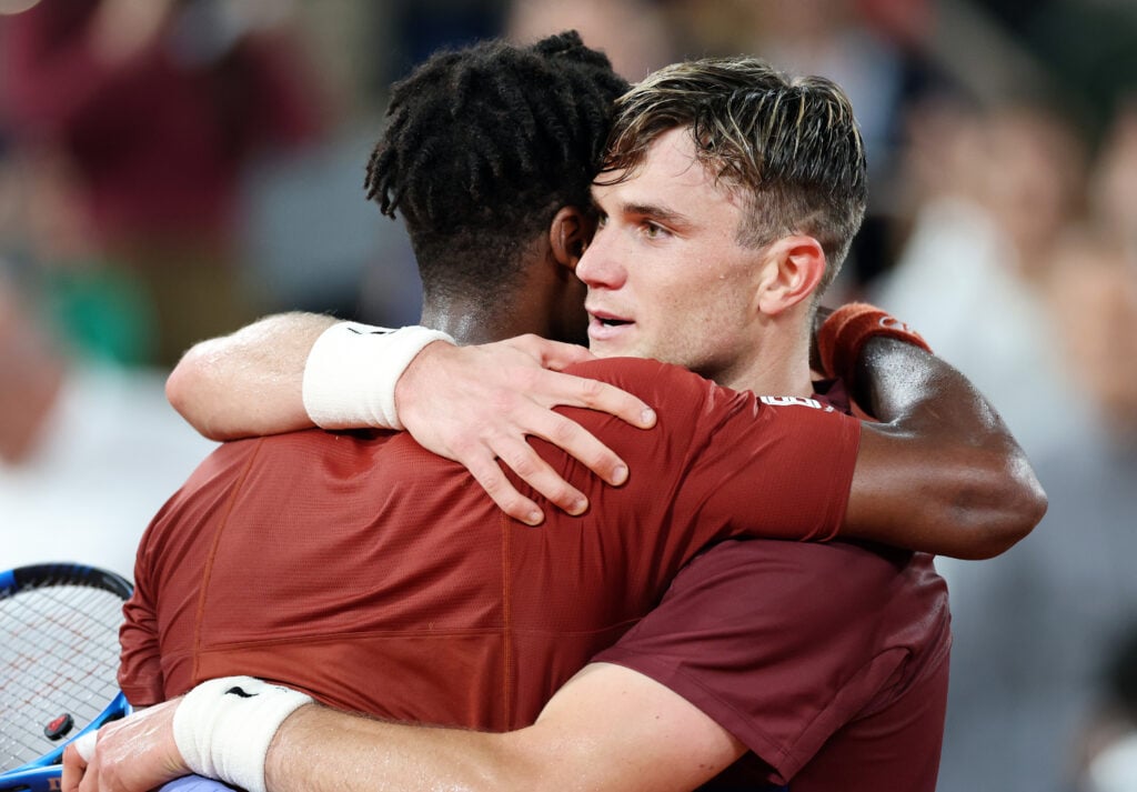 Jack Draper and Gael Monfils embrace at the net after their classic at the 2025 French Open