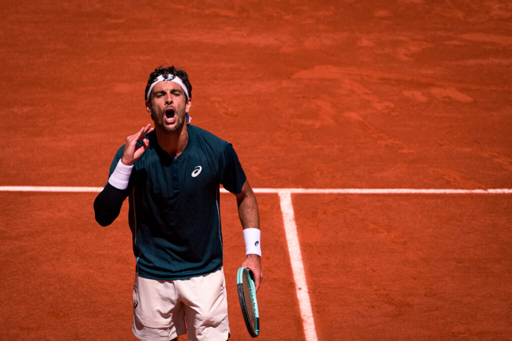 Lorenzo Musetti celebrating a point at the French Open.