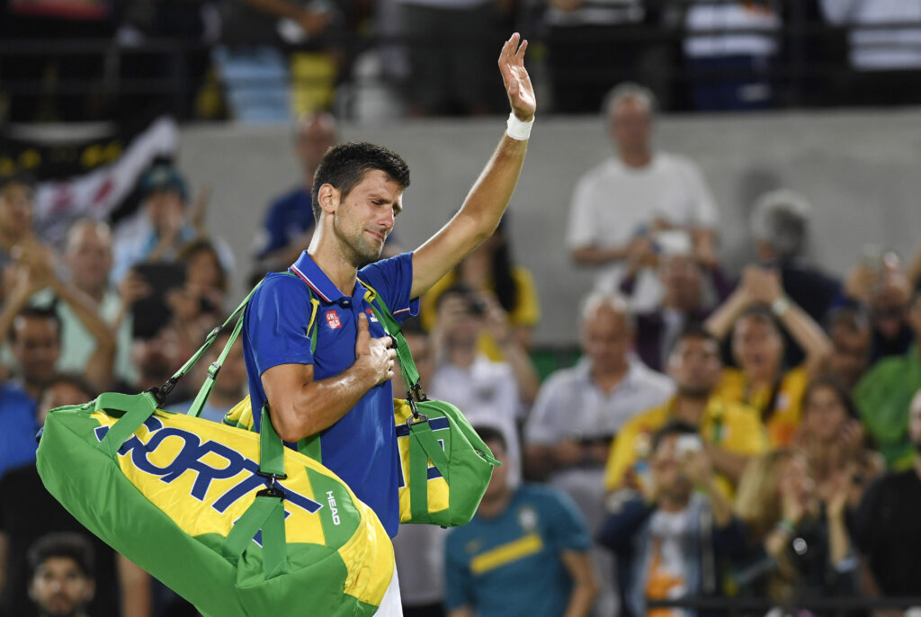 Novak Djokovic leaving the court at the 2016 Olympics in Rio after losing to Juan Martin Del Potro in the first round