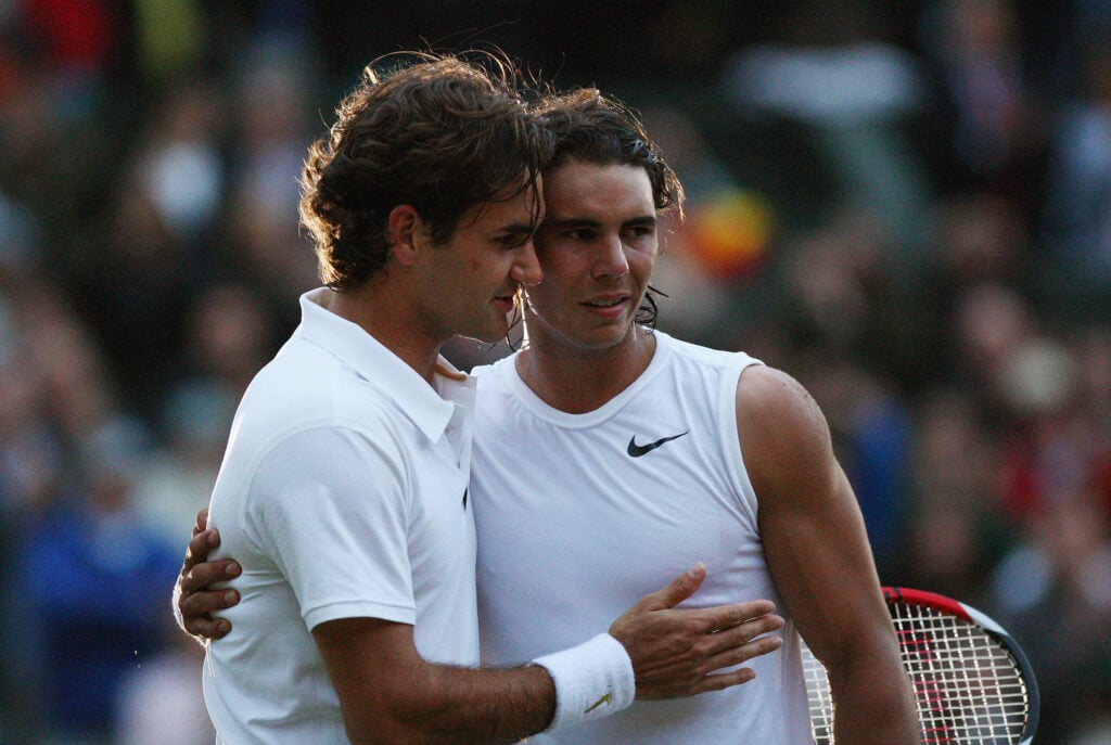 Roger Federer and Rafael Nadal hug after the 2008 Wimbledon final.