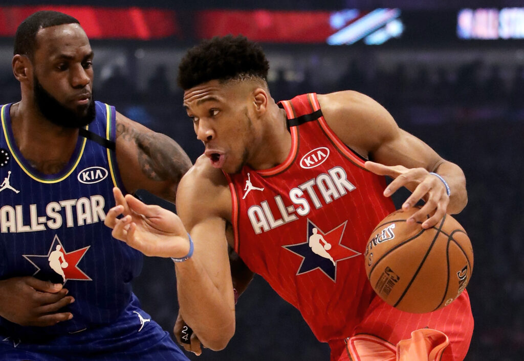 Giannis Antetokounmpo dribbles past Lebron James at the 2020 NBA All-Star game