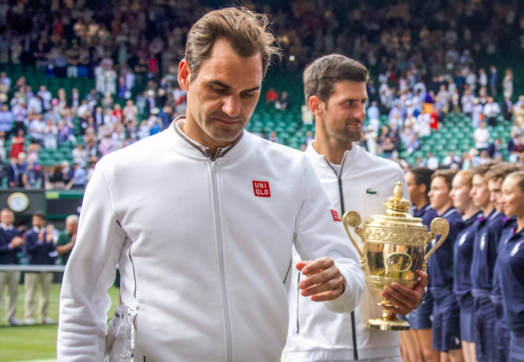 Roger Federer looks down after the 2019 Wimbledon final.