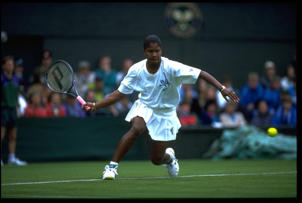LORI MCNEIL OF THE UNITED STATES PLAYS A FOREHAND SHOT DURING HER FIRST ROUND MATCH AGAINST STEFFI GRAF OF GERMANY AT THE 1994 WIMBLEDON TENNIS CHAMPIONSHIPS.