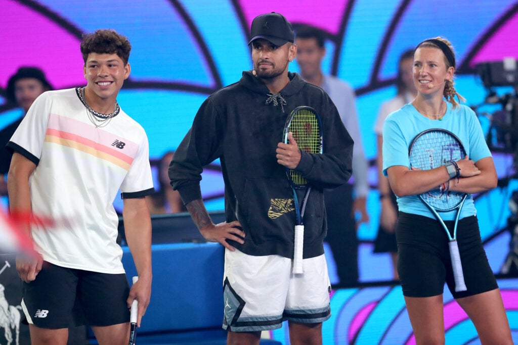 Ben Shelton of United States, Nick Kyrgios of Australia and Victória Azárenka of Belarus react during Kids Tennis Day presented by Emirates during a practice session ahead of the 2023 Australian Open at Melbourne Park.