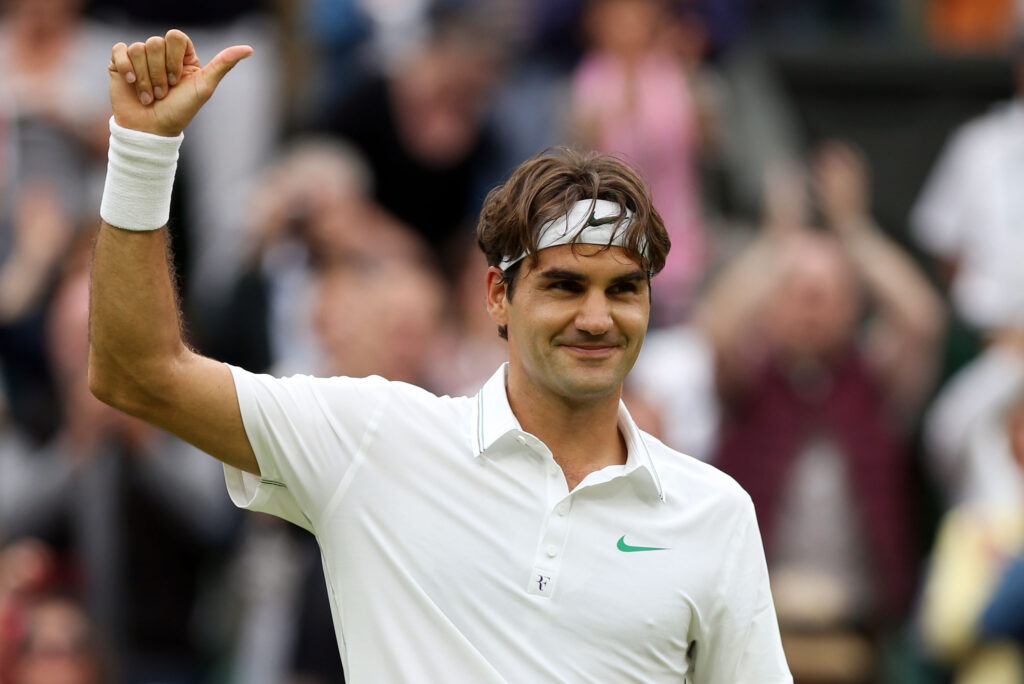 Roger Federer celebrates his win over Novak Djokovic at Wimbledon in 2012