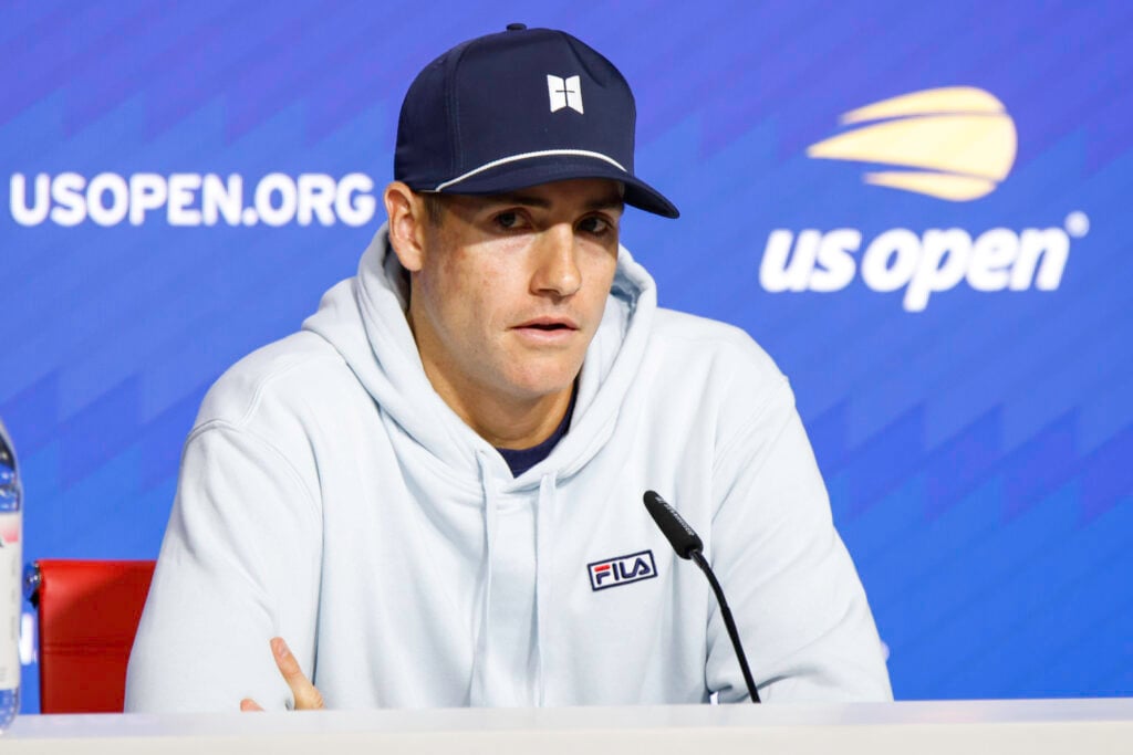 John Isner attends a press conference at the USTA Billie Jean King National Tennis Center.