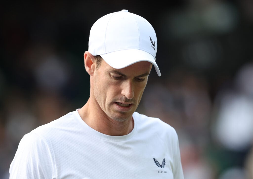 Andy Murray looks on during the 2024 Wimbledon doubles tournament.