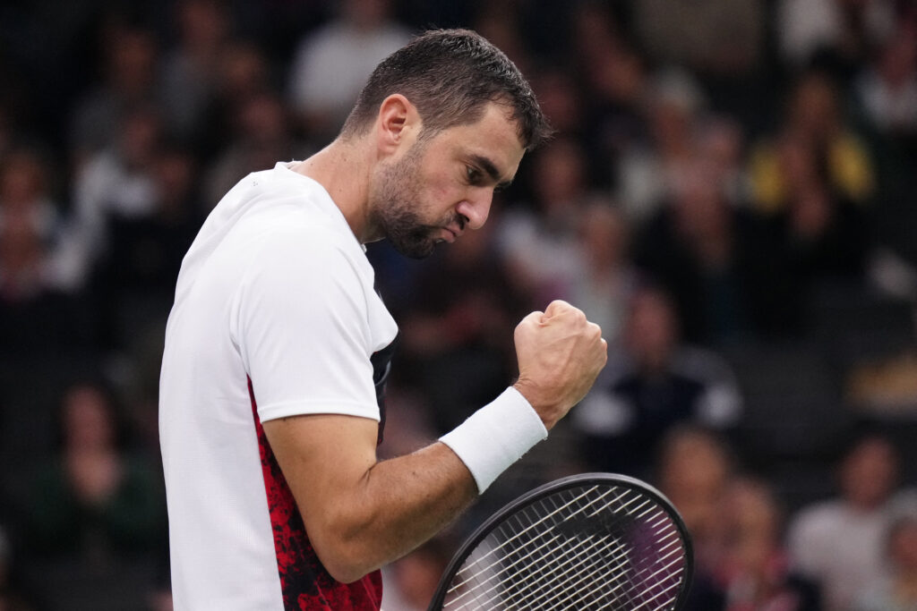 Croatia's Marin Cilic celebrates after a point as he plays against France's Arthur Fils during their men's singles match on day two of the Paris ATP Masters 1000 tennis tournament at the Accor Arena.