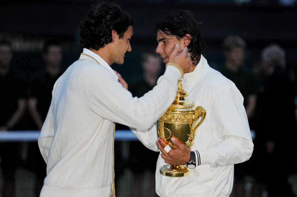 Rafael Nadal celebrates with the title after winning the 2008 Wimbledon final