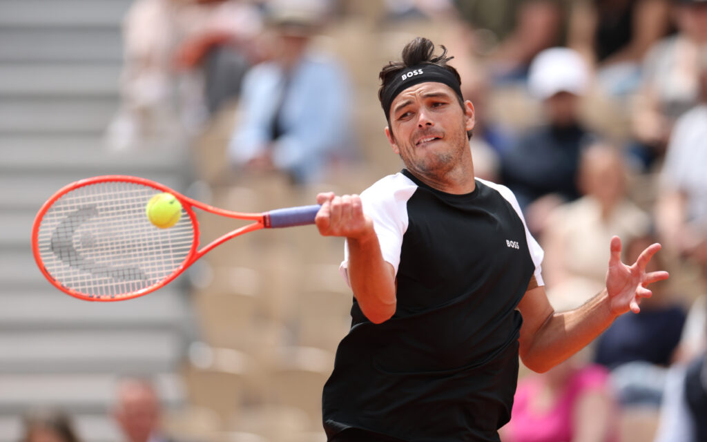 Taylor Fritz of United States plays a forehand against Daniel Altmaier of Germany during the Men's Singles First Round match on Day Two of the 2025 French Open