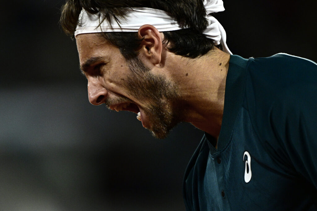 Lorenzo Musetti roars at the French Open.