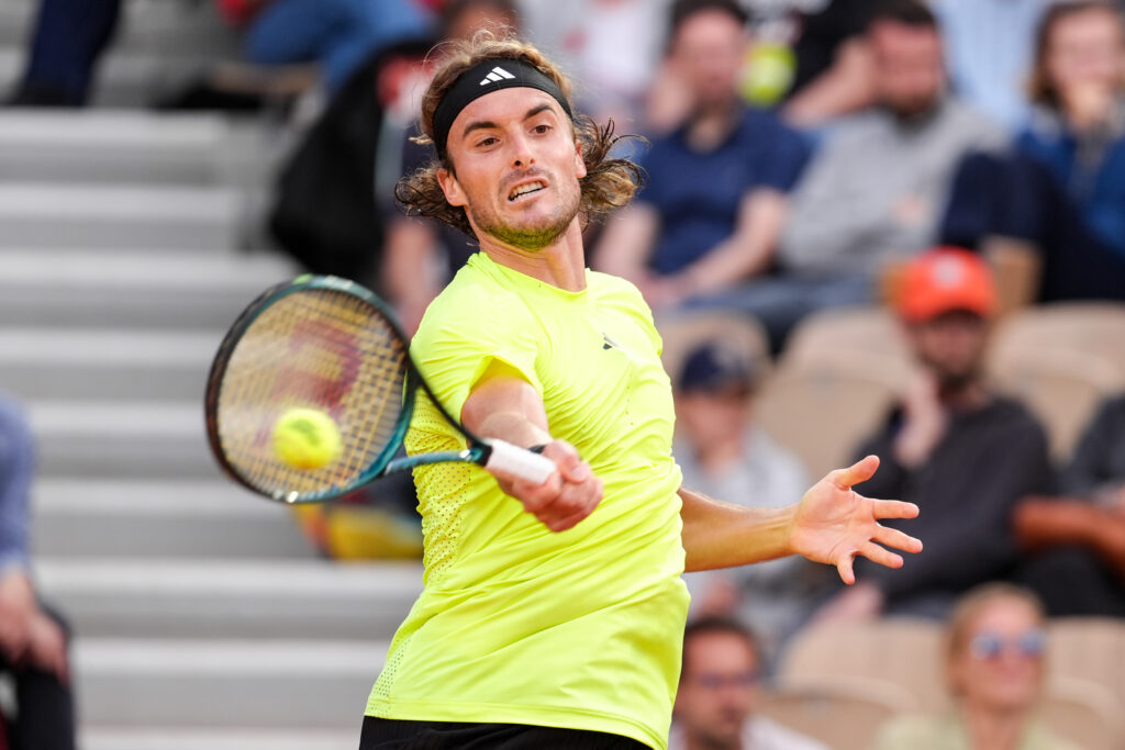Stefanos Tsitsipas plays a forehand against Matteo Gigante at the 2025 French Open