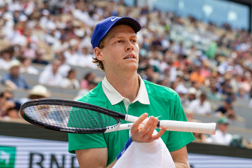 Jannik Sinner of Italy during his match against Richard Gasquet of France in the second round of the singles competition on a packed Court Philippe-Chatrier during the 2025 French Open Tennis Tournament at Roland Garros.