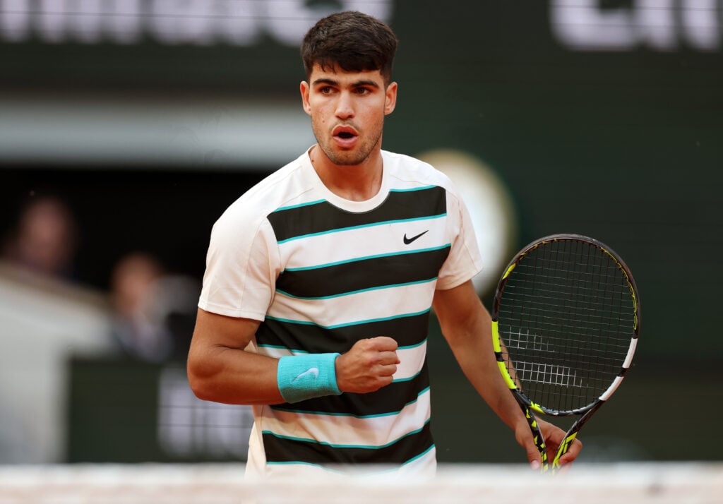 Carlos Alcaraz celebrates during his win over Tommy Paul at the 2025 French Open