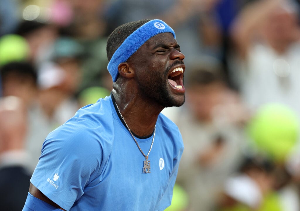 Frances Tiafoe of United States celebrates winning match point against Daniel Altmaier of Germany during the Men's Singles Fourth Round match on Day Eight of the 2025 French Open at Roland Garros.