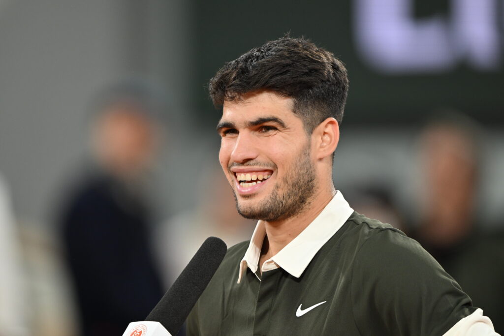 Carlos Alcaraz speaks to the media after his win over Lorenzo Musetti at the 2025 French Open