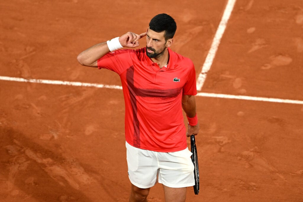 Novak Djokovic celebrates winning a point at the 2025 French Open