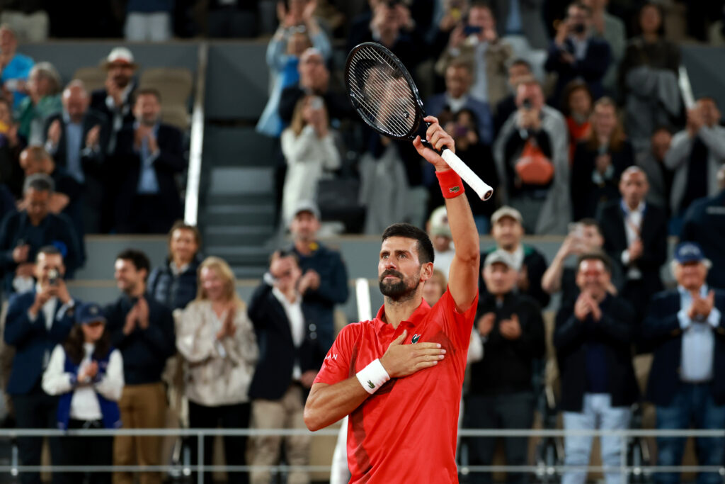 Novak Djokovic acknowledges the crowd after his win over Alexander Zverev at the 2025 French Open