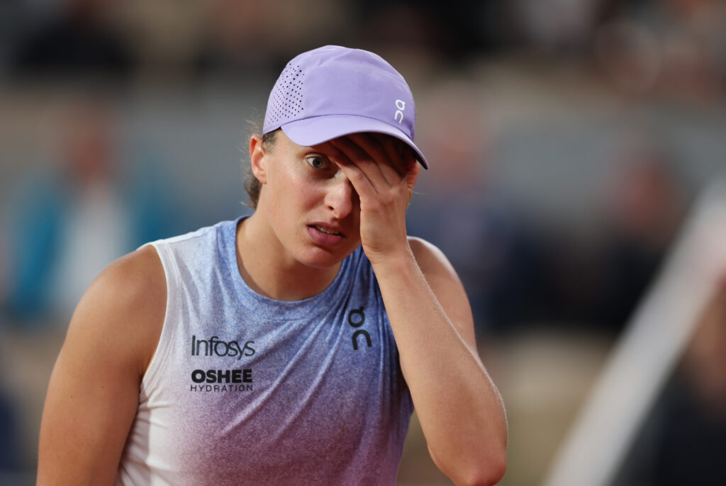 Iga Swiatek of Poland reacts against Aryna Sabalenka in the Women's Singles Semi Final match on Day Twelve of the 2025 French Open at Roland Garros.