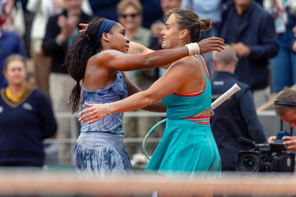 Coco Gauff and Aryna Sabalenka embrace after the 2025 French Open final