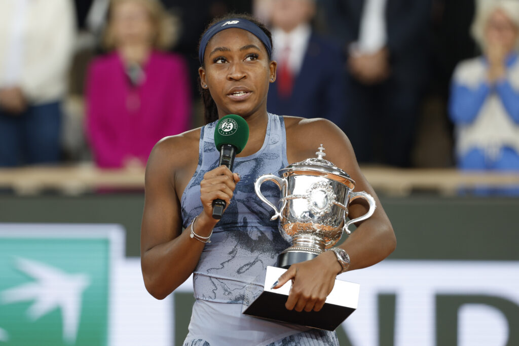Winner Coco Gauff of USA celebrates during the podium ceremony after her victory against Aryna Sabalenka of Belarus in the women's final on day 14 of the 2025 French Open, Roland-Garros 2025.