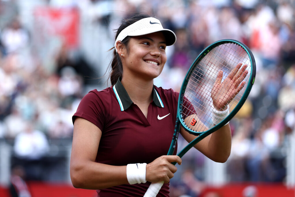 Emma Raducanu celebrates her first-round win at Queen's in 2025