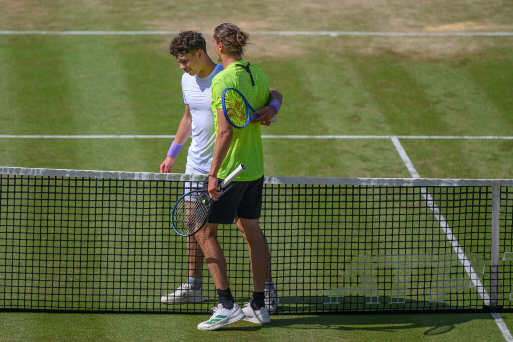 Alexander Zverev and Ben Shelton hug at the net in Stuttgart.