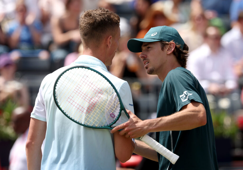 Jiri Lehecka and Alex de Minaur shake hands at the need after their match at Queen's.
