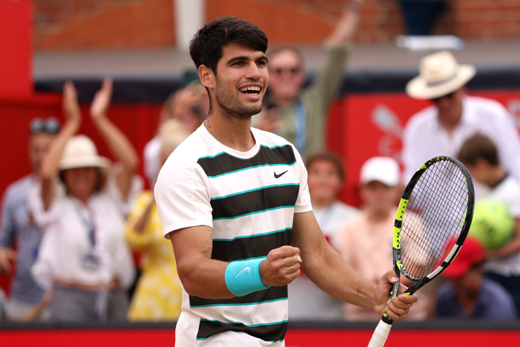 Carlos Alcaraz celebrates at Queen's.