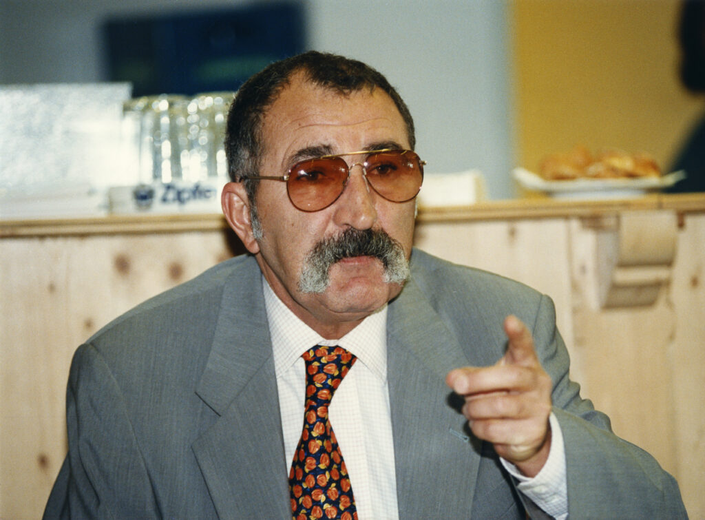 Ion Tiriac seen pointing in Germany in 1997