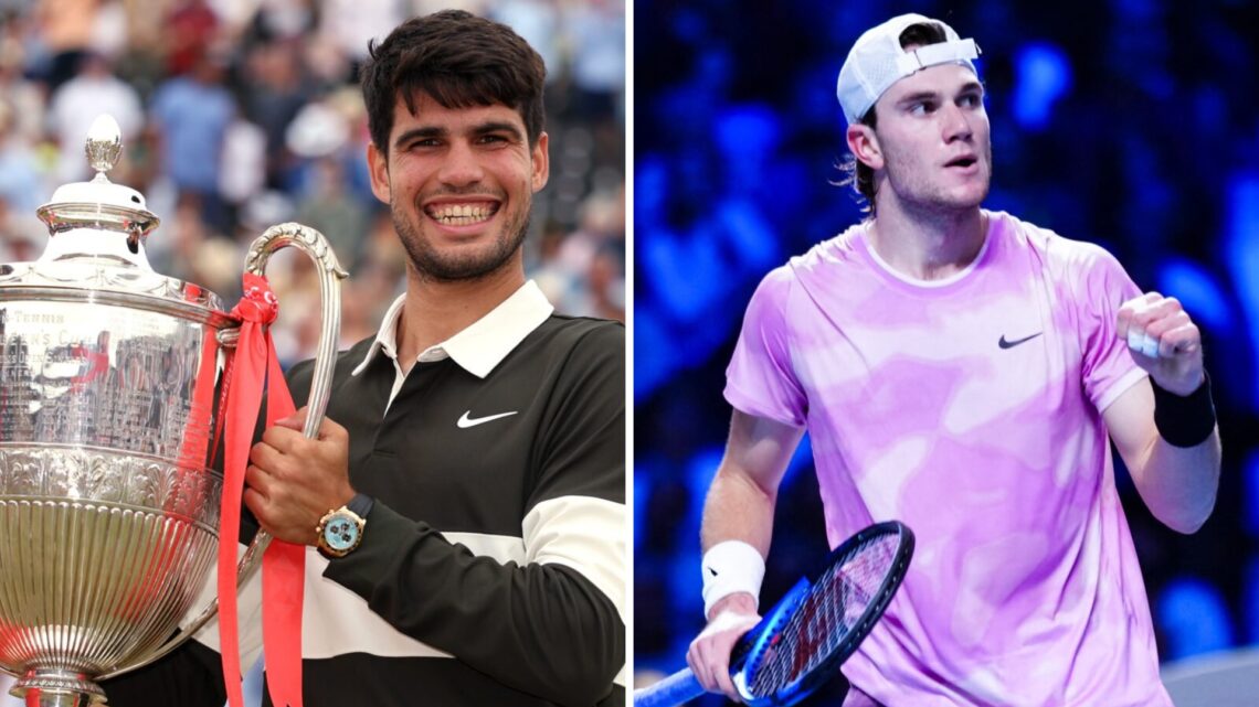 Carlos Alcaraz of Spain poses for a photo with the HSBC Championships 2025 Winners Trophy. Britain's Jack Draper reacts during his match with Italy...