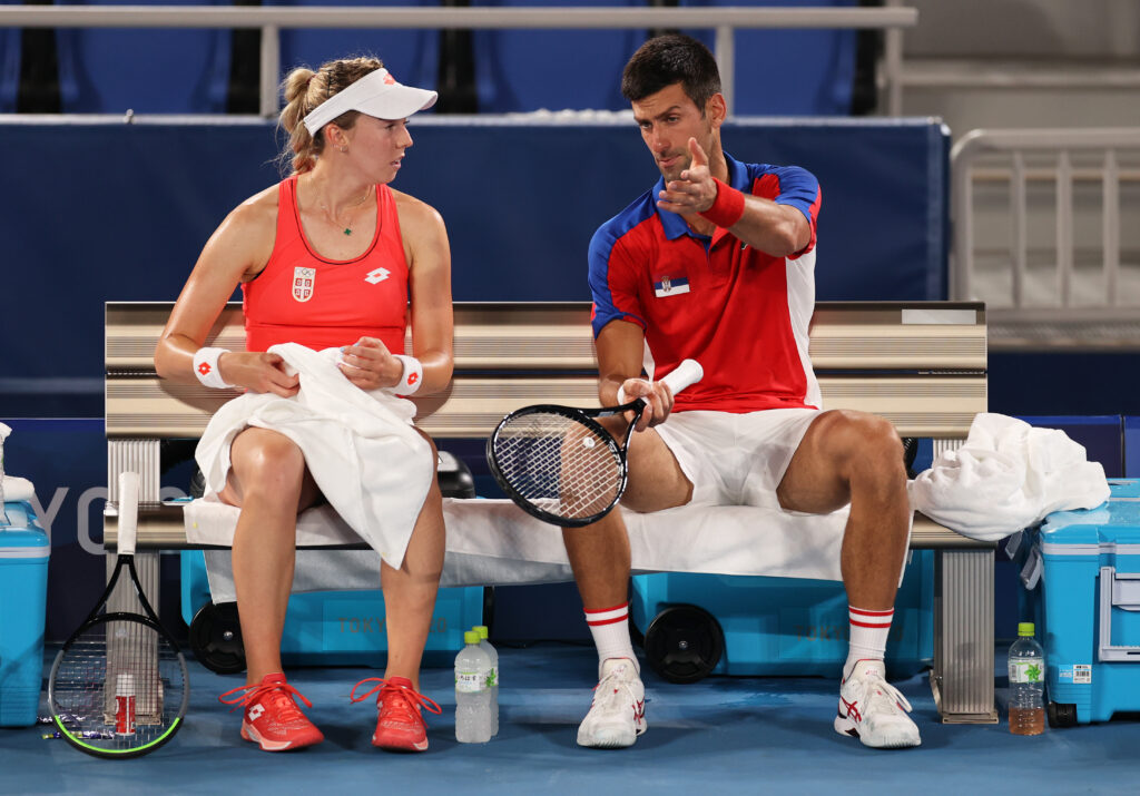 Novak Djokovic of Team Serbia and Nina Stojanovic of Team Serbia play against Marcelo Melo of Team Brazil and Luisa Stefani of Team Brazil during their Mixed Doubles First Round match on day five of the Tokyo 2020 Olympic Games at Ariake Tennis Park.