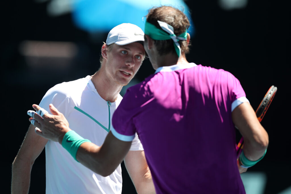 Rafael Nadal of Spain and Denis Shapovalov of Canada exchange words in their Men's Singles Quarterfinals match during day nine of the 2022 Australian Open at Melbourne Park.