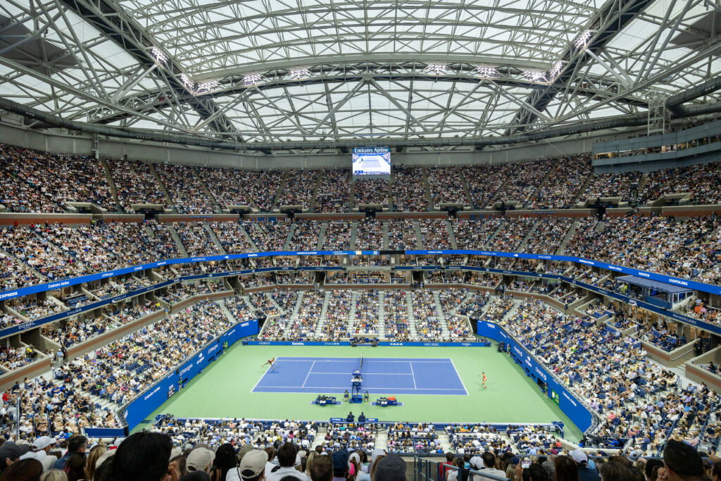 A general view of Coco Gauff of the United States in action against Aryna Sabalenka of Belarus in the Women's Singles Final on a packed Arthur Ashe Stadium with the roof closed during the US Open Tennis Championship 2023 at the USTA National Tennis Centre.